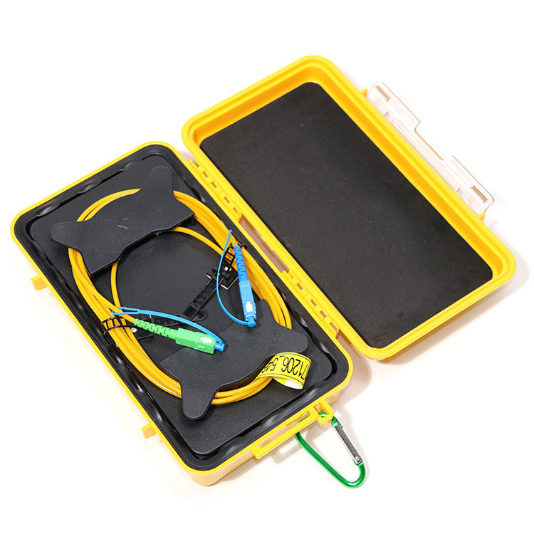 Riselink OTDR launch cable box, open angled view with example SC/UPC and SC/APC connectors